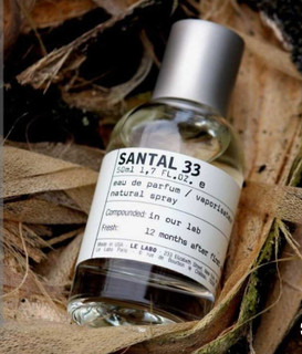 عطر سانتال ۳۳ اصلی اسانس گرمی لوزی سوعیس ماندگاری و پخش بوی قوی از پرفیوم مرجانی